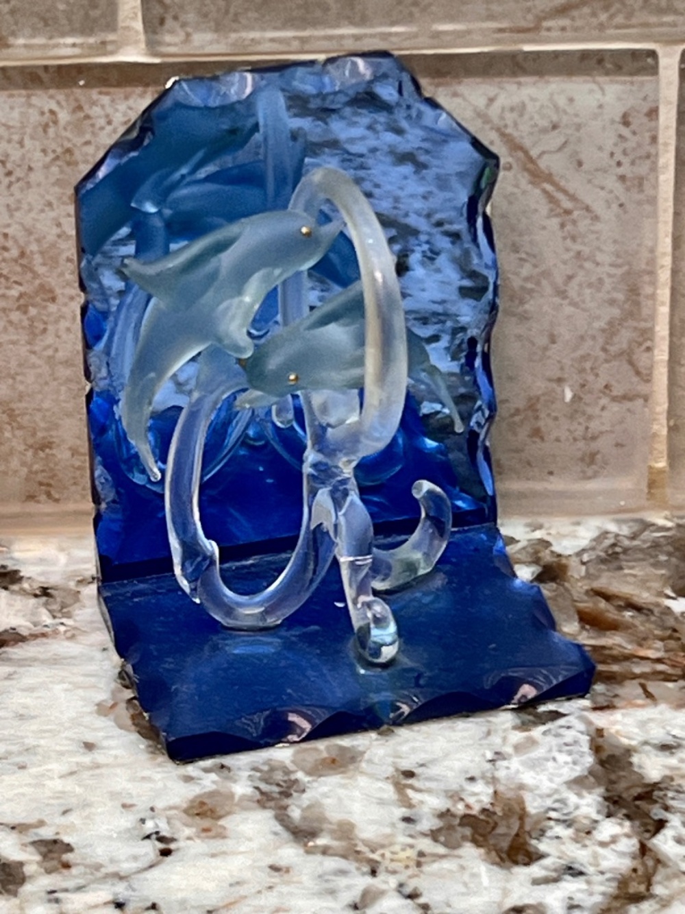 Unique Artico rosted glass dolphins meticulously crafted to leap a glass wave
